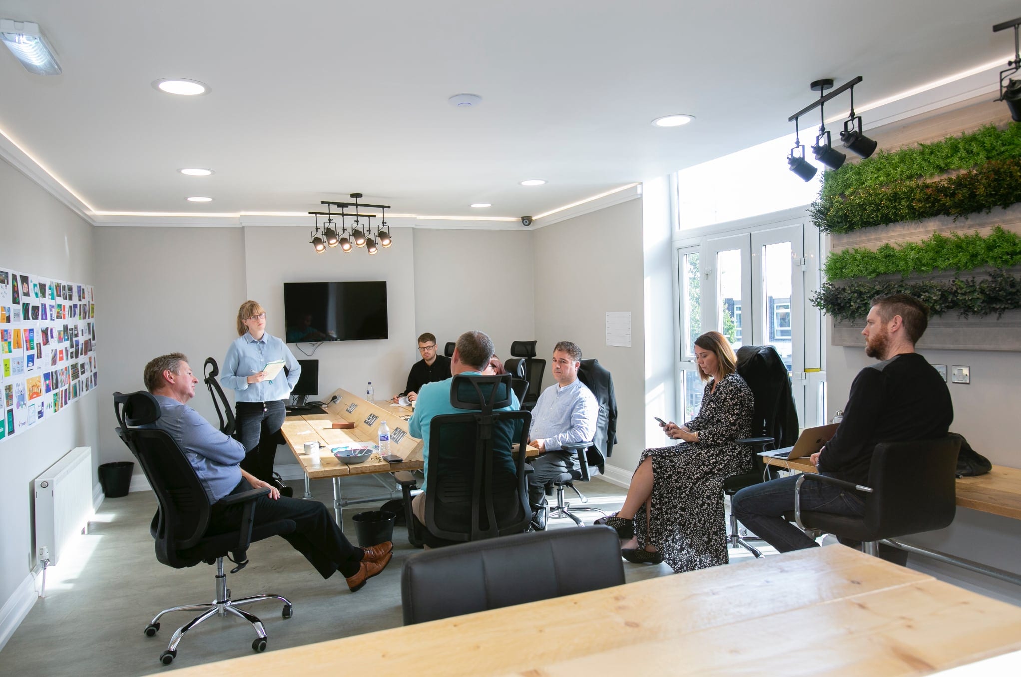 A meeting in progress in the boardroom at ShiftWorks Market Street, Hoylake