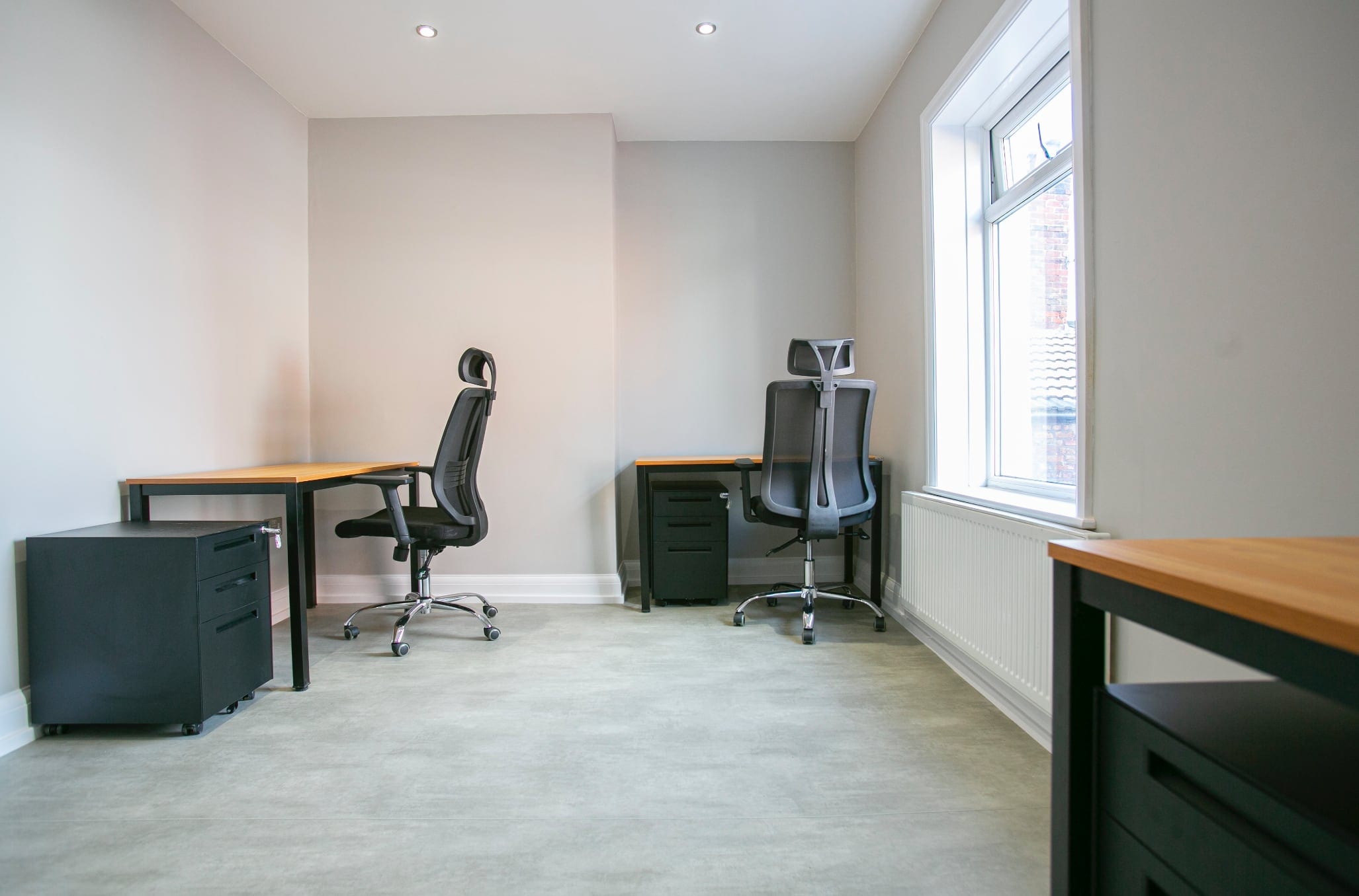 A private office at ShiftWorks Market Street, Hoylake, with two desks