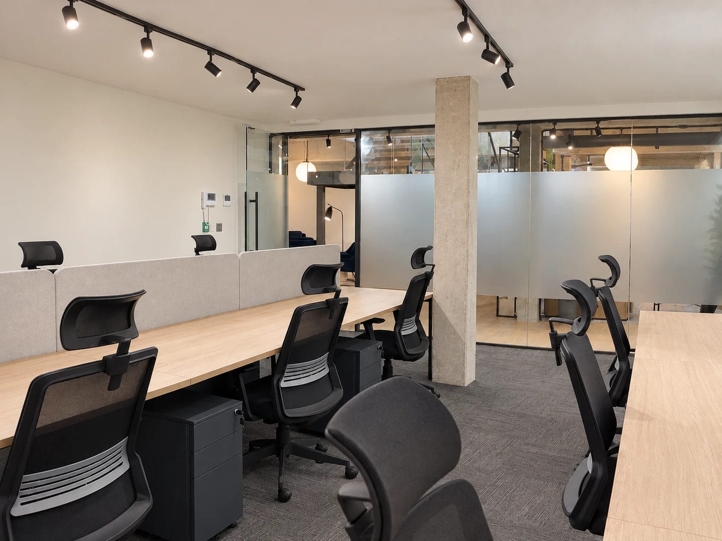 A private office at ShiftWorks Royal House, Chester, with desks behind frosted glass